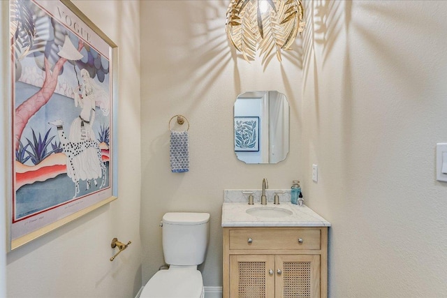 22 Wingreen Loop, The Hills, TX 78738 - bathroom featuring vanity and toilet