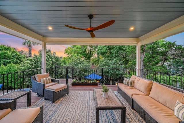 22 Wingreen Loop, The Hills, TX 78738 - deck at dusk with outdoor lounge area and ceiling fan