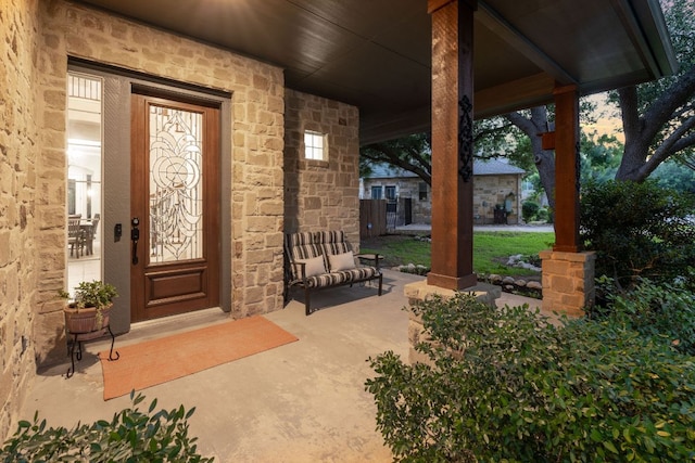 3022 Luminoso Ln E, Round Rock, TX 78681 - entrance to property featuring stone siding and a porch