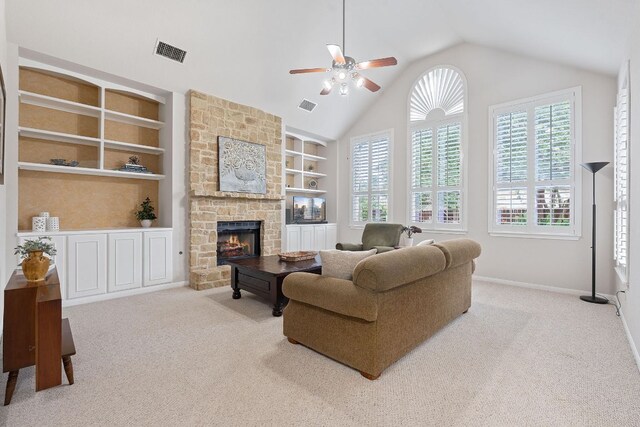 3022 Luminoso Ln E, Round Rock, TX 78681 - living area with plenty of natural light, carpet flooring, and lofted ceiling