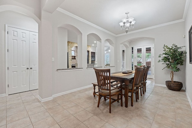 3022 Luminoso Ln E, Round Rock, TX 78681 - dining room featuring light tile patterned floors, crown molding, a chandelier, and baseboards