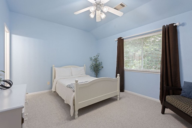 3022 Luminoso Ln E, Round Rock, TX 78681 - bedroom featuring light carpet, vaulted ceiling, baseboards, and ceiling fan