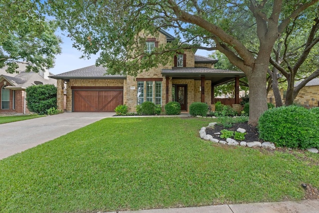 3022 Luminoso Ln E, Round Rock, TX 78681 - view of front of house featuring a garage, a front lawn, concrete driveway, a shingled roof, and stone siding