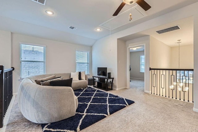 149 Woods Edge Ln, Georgetown, TX 78628 - carpeted living room featuring attic access, a ceiling fan, plenty of natural light, baseboards, and recessed lighting