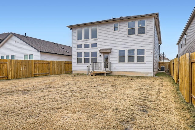 149 Woods Edge Ln, Georgetown, TX 78628 - rear view of property with a fenced backyard and cooling unit