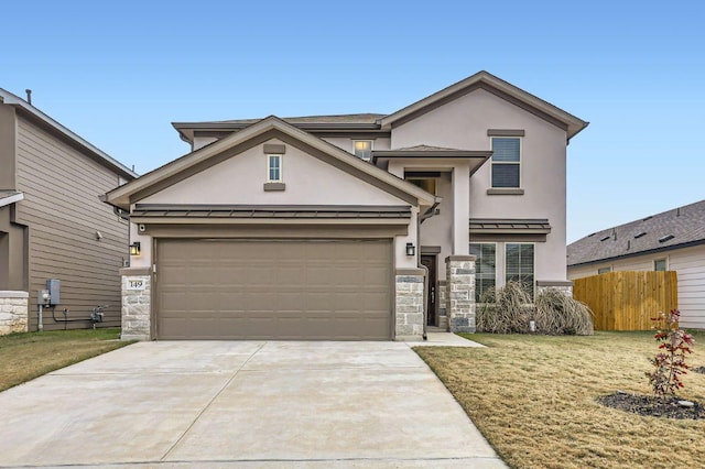 149 Woods Edge Ln, Georgetown, TX 78628 - view of front of property featuring stone siding, stucco siding, driveway, and an attached garage