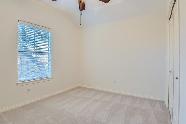 9707 Anderson Mill Rd Unit 32, Austin, TX 78750 - spare room featuring ceiling fan, plenty of natural light, light colored carpet, and vaulted ceiling