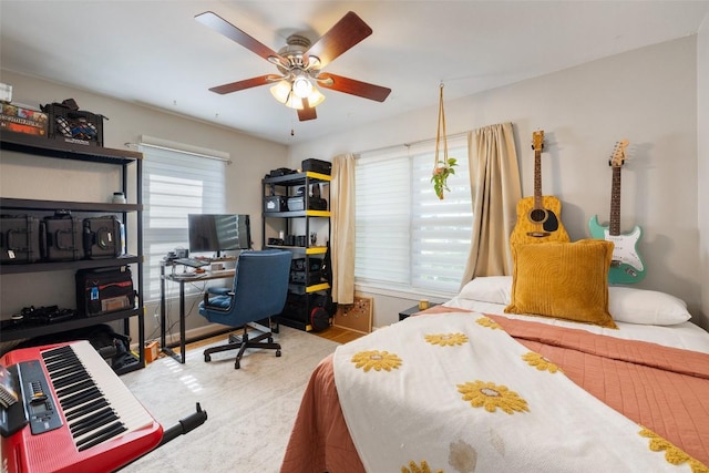 1308 Berkshire Dr, Austin, TX 78723 - bedroom featuring an office area and a ceiling fan