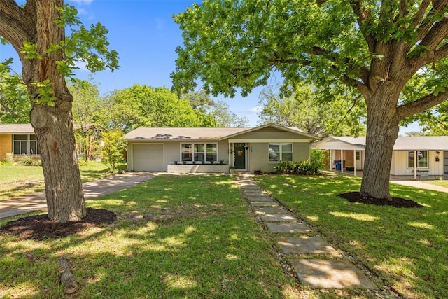 1308 Berkshire Dr, Austin, TX 78723 - ranch-style house with an attached garage, a front lawn, and driveway