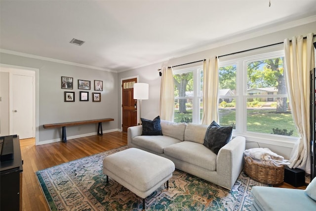 1308 Berkshire Dr, Austin, TX 78723 - living area with wood finished floors, ornamental molding, and baseboards