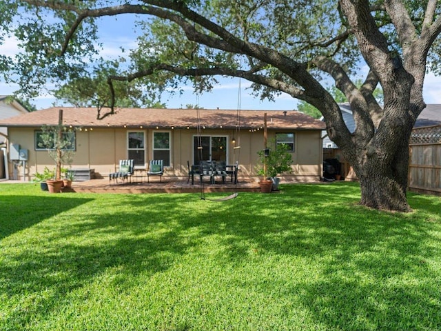 2600 Cockburn Dr, Austin, TX 78745 - rear view of house featuring a patio area and stucco siding