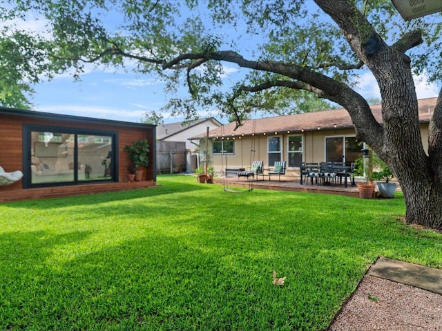 2600 Cockburn Dr, Austin, TX 78745 - rear view of property featuring a patio