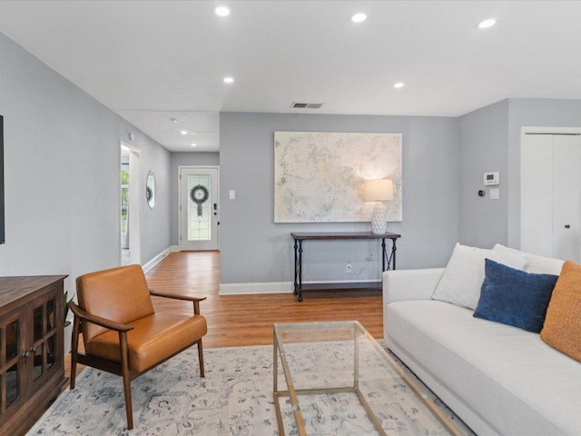2600 Cockburn Dr, Austin, TX 78745 - living room featuring wood finished floors and recessed lighting