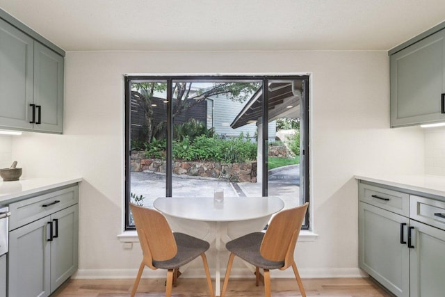 3902 Knollwood Dr Unit A, Austin, TX 78731 - dining area with light wood-style flooring and baseboards