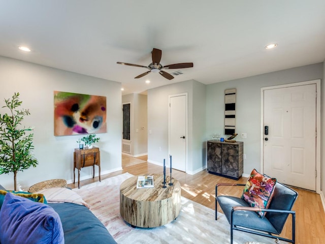 1705 Adriane Dr, Austin, TX 78721 - living room featuring light wood-type flooring, ceiling fan, recessed lighting, and baseboards