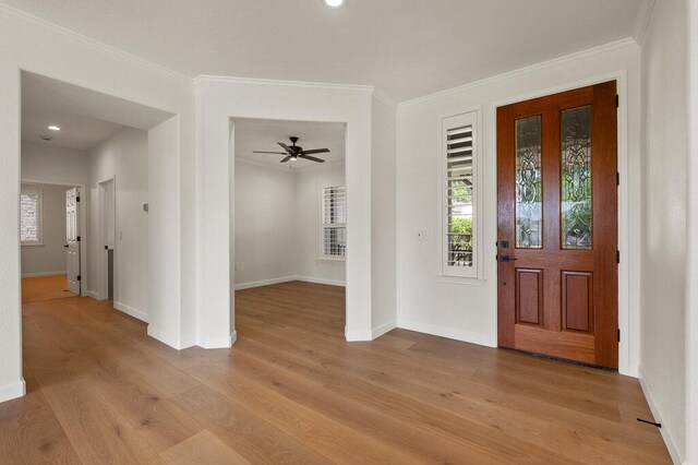 110 Chuckwagon Trl, Georgetown, TX 78633 - foyer featuring light wood-style flooring, baseboards, ornamental molding, ceiling fan, and recessed lighting