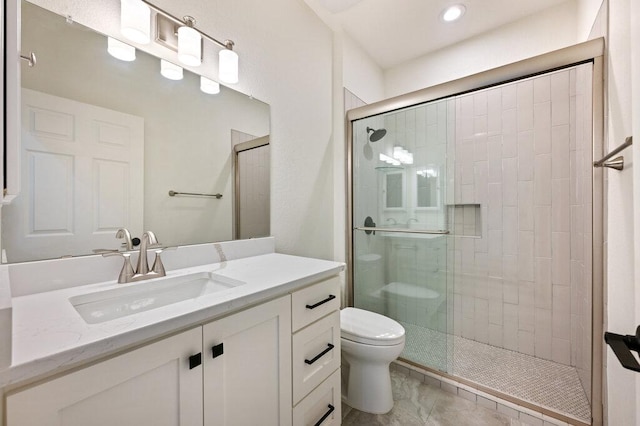 110 Chuckwagon Trl, Georgetown, TX 78633 - bathroom featuring vanity, tiled shower, and recessed lighting