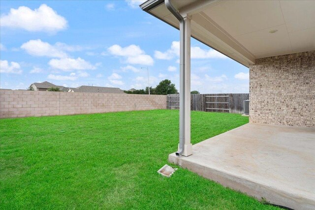 13705 Mc Arthur Dr, Manor, TX 78653 - view of yard featuring a patio and central air condition unit