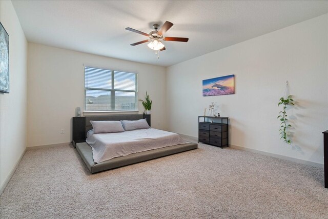 13705 Mc Arthur Dr, Manor, TX 78653 - carpeted bedroom featuring a ceiling fan and baseboards