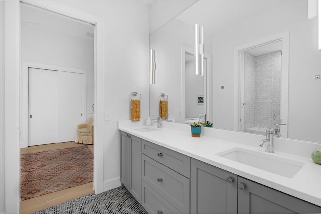 6202 Nasco Dr, Austin, TX 78757 - bathroom with double vanity, a bath, and a shower