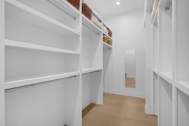 6202 Nasco Dr, Austin, TX 78757 - walk in closet featuring light wood-type flooring