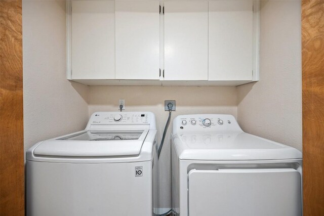 8617 Putnam Dr Unit C, Austin, TX 78757 - washroom featuring cabinet space and separate washer and dryer