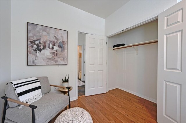 1169 Curve St, Austin, TX 78702 - living area with light wood-type flooring and baseboards