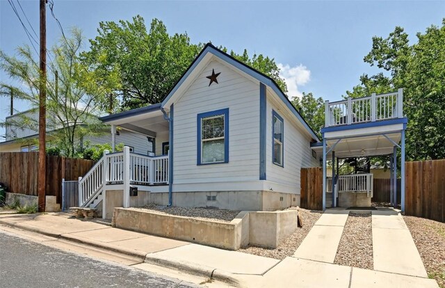 1169 Curve St, Austin, TX 78702 - view of front of house featuring covered porch and crawl space