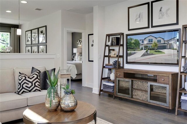 12109 Maypole Bnd, Austin, TX 78717 - living area featuring wood finished floors, recessed lighting, and baseboards
