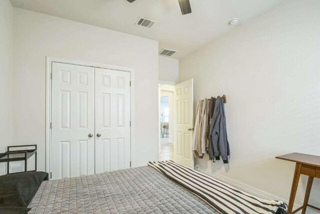 340 Beretta Cir, Georgetown, TX 78628 - bedroom with a closet, carpet flooring, and a ceiling fan