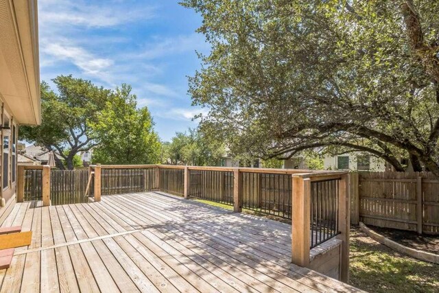 340 Beretta Cir, Georgetown, TX 78628 - deck with a fenced backyard