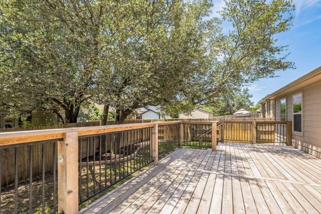 340 Beretta Cir, Georgetown, TX 78628 - deck with a fenced backyard