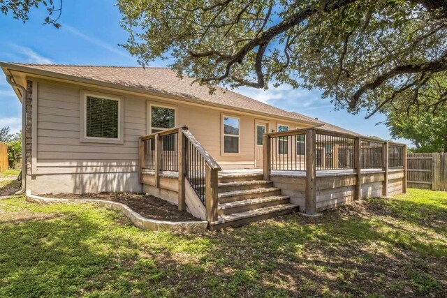 340 Beretta Cir, Georgetown, TX 78628 - rear view of property featuring a wooden deck
