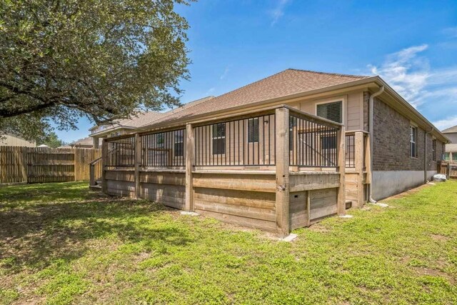 340 Beretta Cir, Georgetown, TX 78628 - rear view of house featuring a wooden deck