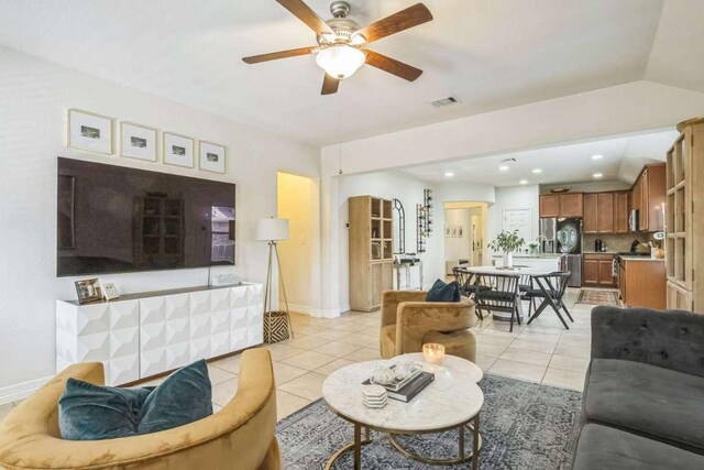 340 Beretta Cir, Georgetown, TX 78628 - living area featuring light tile patterned floors, a ceiling fan, baseboards, and recessed lighting