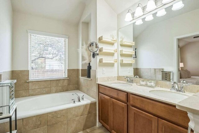 340 Beretta Cir, Georgetown, TX 78628 - bathroom with a bath and double vanity