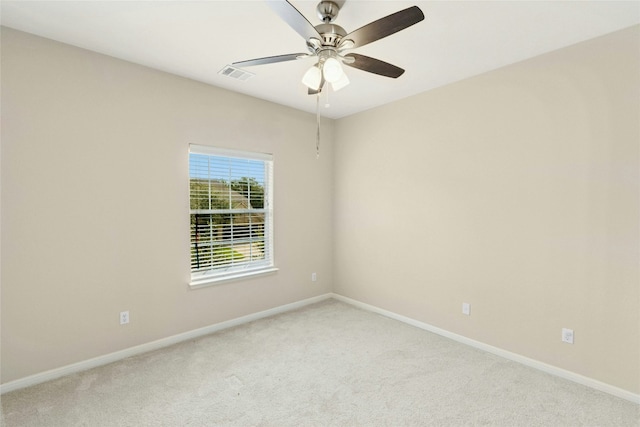 7420 Jaborandi Dr, Austin, TX 78739 - spare room with light carpet, baseboards, and a ceiling fan