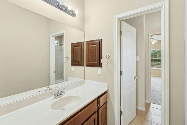 7420 Jaborandi Dr, Austin, TX 78739 - full bath with vanity, tile patterned flooring, a shower, and ceiling fan