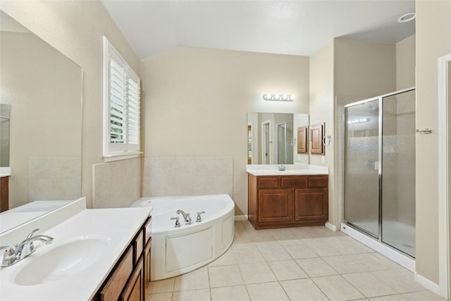 7420 Jaborandi Dr, Austin, TX 78739 - full bath with tile patterned flooring, a shower stall, two vanities, a bath, and lofted ceiling