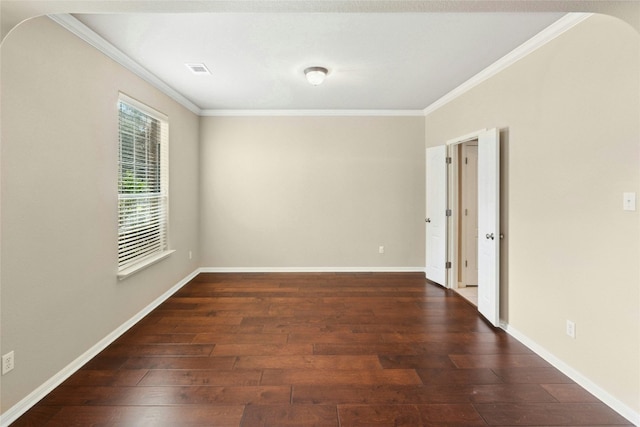 7420 Jaborandi Dr, Austin, TX 78739 - spare room with crown molding, wood finished floors, baseboards, and arched walkways