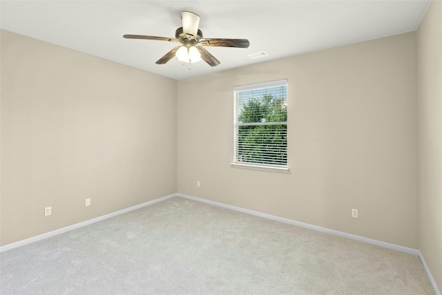 7420 Jaborandi Dr, Austin, TX 78739 - spare room featuring light carpet, baseboards, and a ceiling fan