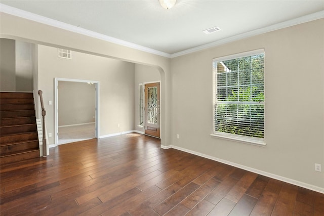 7420 Jaborandi Dr, Austin, TX 78739 - unfurnished room featuring crown molding, arched walkways, stairs, wood finished floors, and baseboards