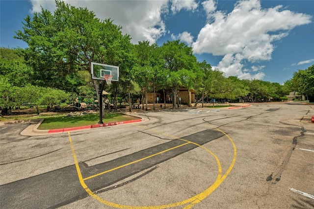 7420 Jaborandi Dr, Austin, TX 78739 - view of sport court with community basketball court and view of scattered trees