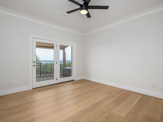 15902 Soleil Ct, Austin, TX 78734 - spare room featuring crown molding, baseboards, light wood-style floors, and a ceiling fan