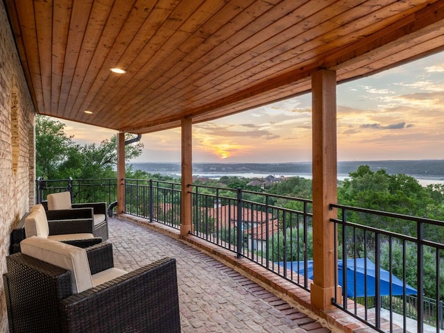 15902 Soleil Ct, Austin, TX 78734 - patio terrace at dusk with a water view