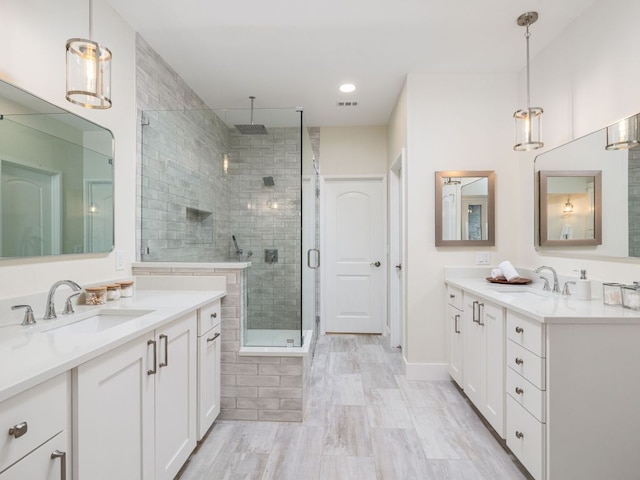 15902 Soleil Ct, Austin, TX 78734 - full bath featuring a shower stall and two vanities