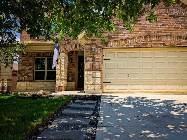 1226 Hidden Cave Dr, New Braunfels, TX 78132 - view of front facade with stone siding, driveway, brick siding, and an attached garage