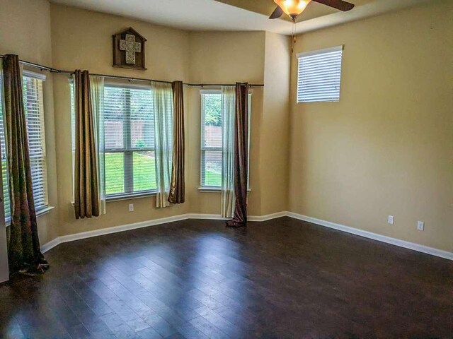 1226 Hidden Cave Dr, New Braunfels, TX 78132 - empty room featuring a ceiling fan, dark wood-type flooring, and baseboards