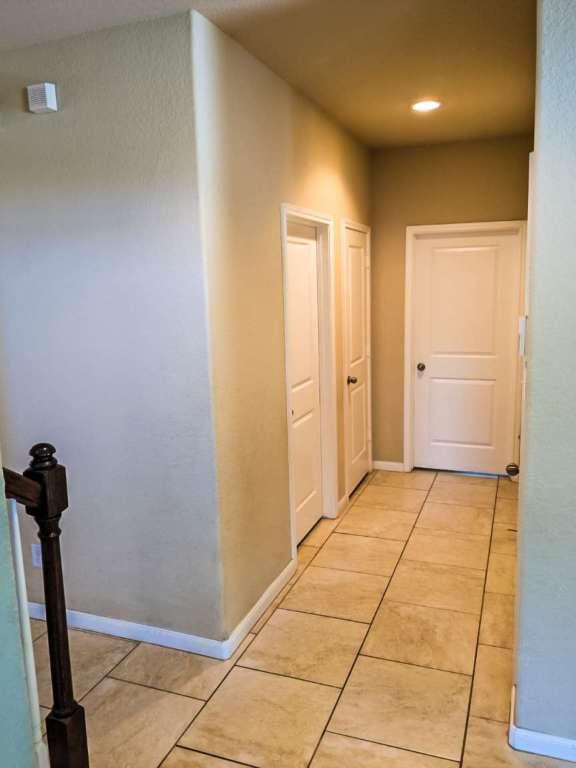 1226 Hidden Cave Dr, New Braunfels, TX 78132 - hall with light tile patterned flooring, baseboards, and recessed lighting