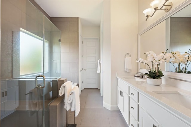 20213 Hidden Gully Ln, Pflugerville, TX 78660 - full bath featuring double vanity, tile patterned flooring, and a shower stall